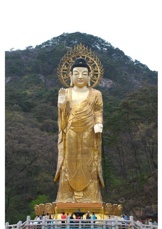 Foto Maitreya-staty av guld
