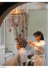 Foton scen från hårsalong med vaxfigurer